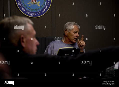 Secretary Of Defense Chuck Hagel Right Briefs Members Of The Press