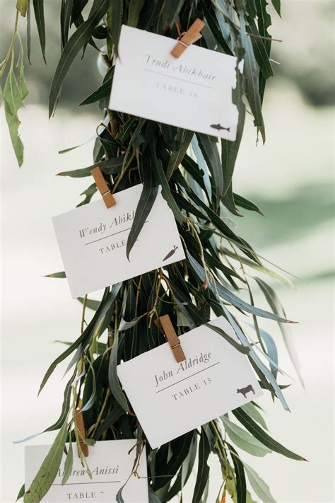 Simple Place Cards On Hanging Eucalyptus