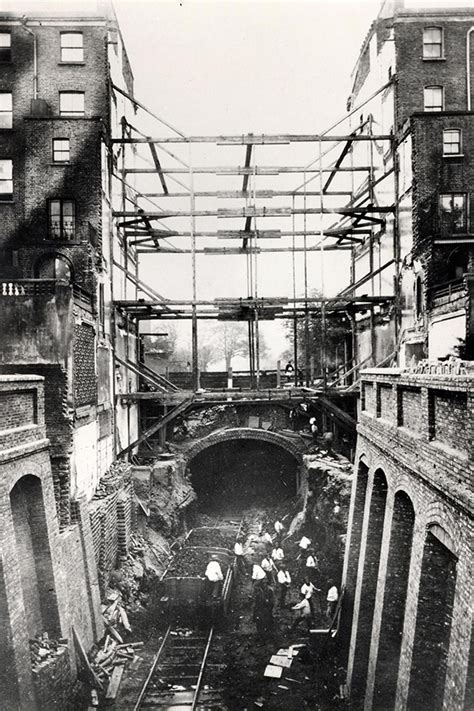 Black and White Photographs of the London Underground being Built.