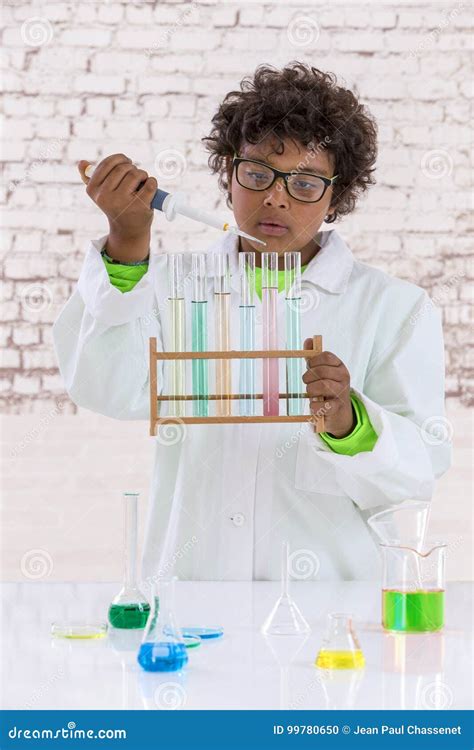 Scientist In Lab Coat Putting Vial With Sample Into Autosampler Of Hplc