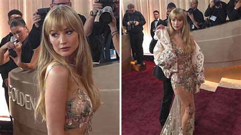 jennifer lawrence shows  dress  golden globes red carpet