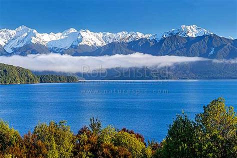 Lake Manapouri And Kepler Mountains And Cathedral Peaks Left Stony