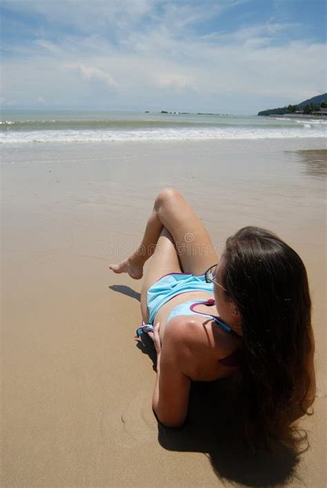 Beautiful Brunette Woman Laying On The Beach Stock Image Image Of Long Tall