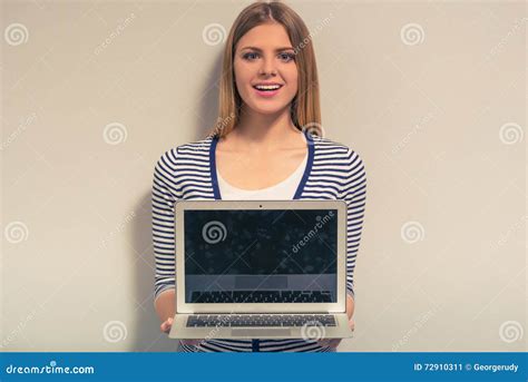 Attractive Girl With Gadget Stock Image - Image of beautiful, holding ...