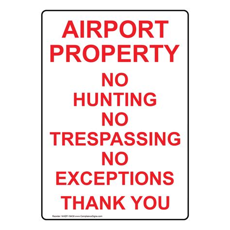 White Vertical Sign Airport Property No Hunting Trespassing