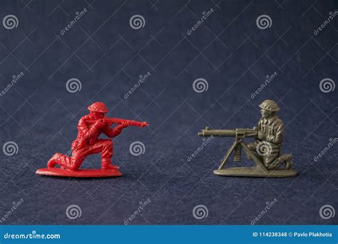 Miniature Toy Soldiers Fighting. Plastic Toy Military Men Models Attack ...