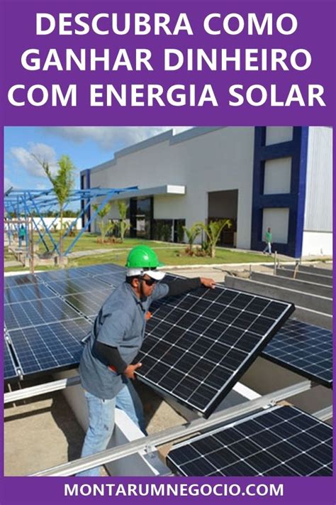 A Man Standing On Top Of A Roof Next To Solar Panels