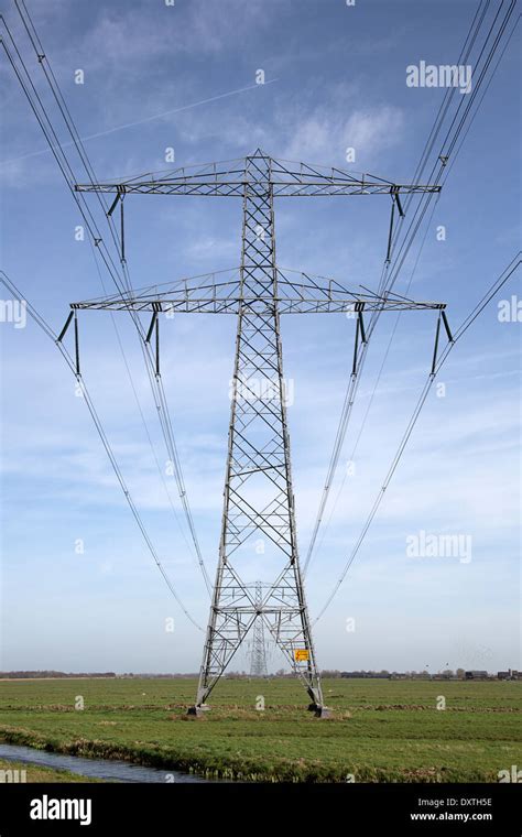 Power Line With Pylons In Dutch Polder Stock Photo Alamy