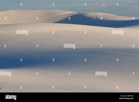 Silhouettes Of The Rippled Gypsum Sand Dunes In The White Sands