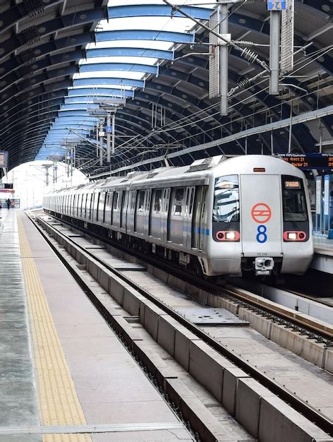 Premium Photo | Delhi metro train arriving at jhandewalan metro station ...