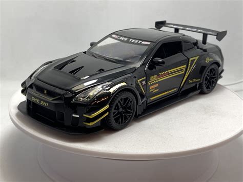 Машинка Nissan GTR, модель 1:24, металлическая, черная - купить с ...