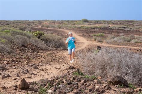 Premium Photo Happy Mature Senior Woman Walking Outdoor In