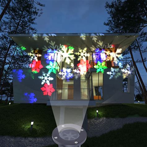 Star shower laser magic light projector WITH SNOWFLAKES. Light up your house before Christmas ...