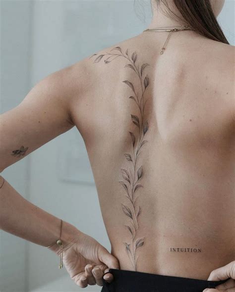 55 Meaningful Fine Line Tattoos For Minimalist Women Floral Back