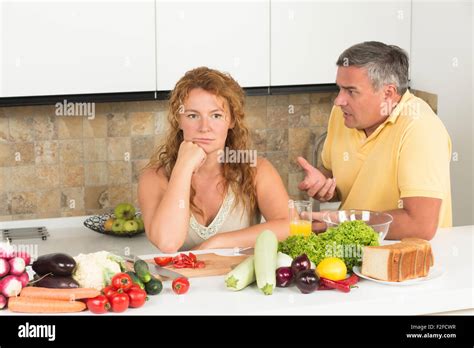 Mature Couple In The Kitchen Stock Photo Alamy