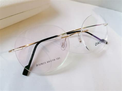 Универсальная безободковая оправа Dacchi D32823-C1 - Opticmir