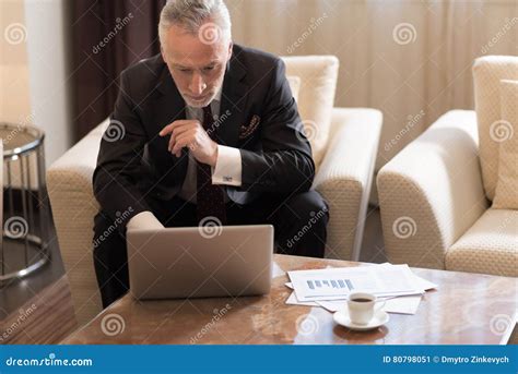 Concentrated Businessman Working With The Laptop In The Hotel Stock