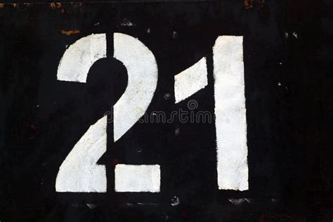 Number 21 In Stencil On Black Metal Wall Stock Photo Image Of Brick