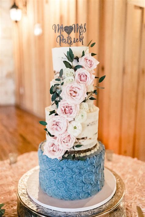 Naked Cake With Blue Rosette Base