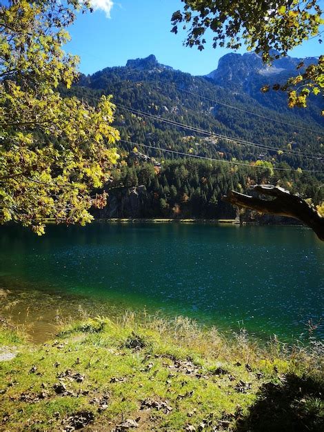 Premium Photo | Relaxing view of a lake with the mountain at the background