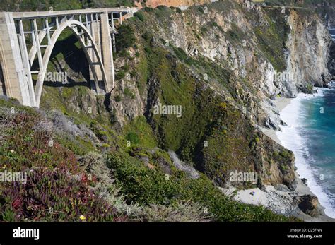 Bixby Creek Bridge On Big Sur Hwy 1 Coastal Road Sunbather On Beach