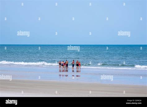 Group Of People On The Atlantic Ocean Beach In Northeast Florida Usa