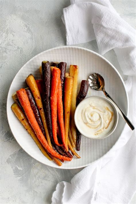 These Easy Roasted Whole Carrots Are Served With A Quick Tahini Yogurt Sauce And Make A