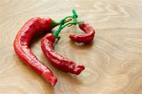 Dried Red Hot Chili Pepper As Spicy Flavoring For Meal A Group Of Bright Red Thai Chili Peppers