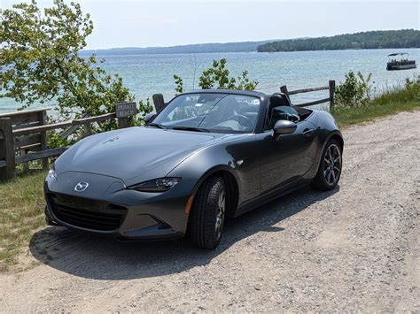 A Miata, a convertible, on a warm, beautiful day in Northport, MI. Life is good. : r/Miata