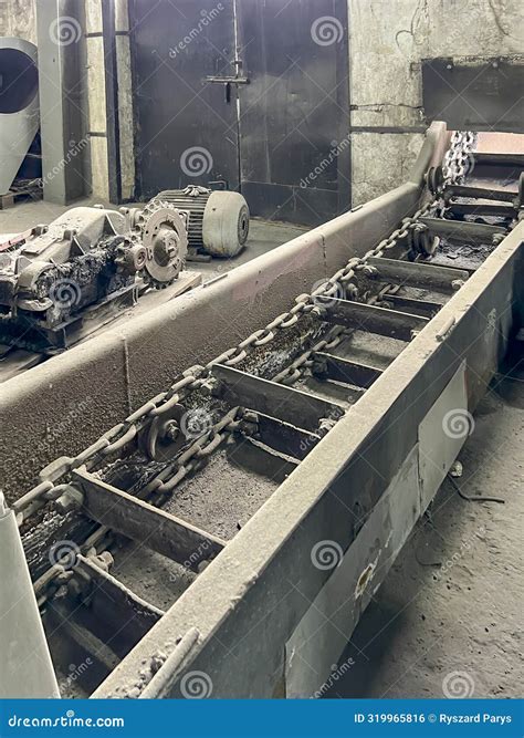 An Old Scraper Feeder for Removing from a Coal Boiler Stock Photo