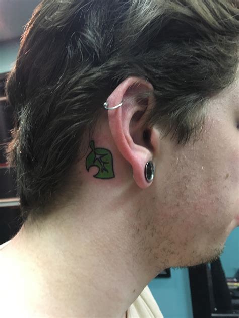 guy tattoo behind ear 5