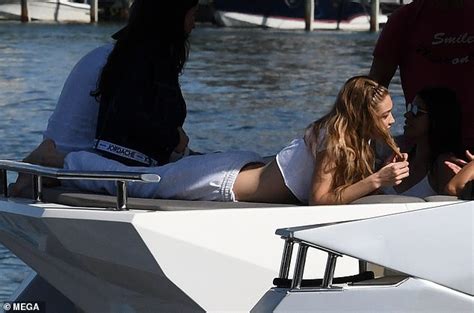 Gigi Hadid Reclines In Maroon Bikini As She Soaks Up Sun In Miami