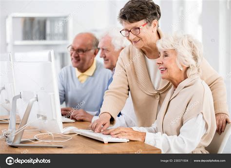 Smiling Elderly Lady Helping Her Friend Computer Classes Seniors Third