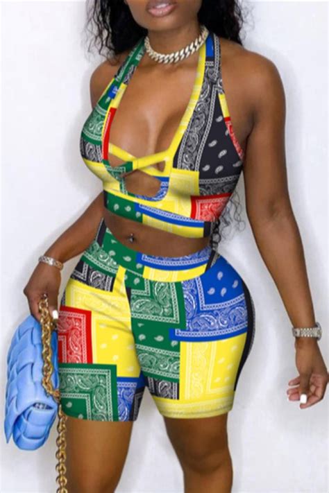 Wholesale Yellow Sexy Casual Print Hollowed Out Patchwork Backless Halter Plus Size Two Pieces