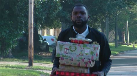 Black Men Of Metro Baton Rouge Walk Neighborhoods Delivering Gifts