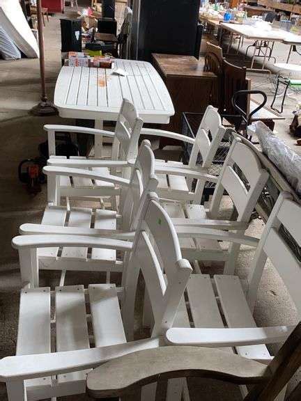 White outdoor table and six chairs - Metzger Property Services LLC