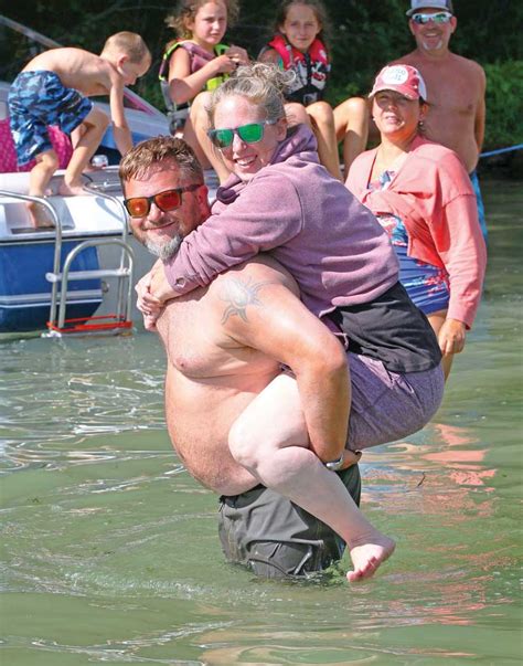 Sam Van Handel Gives His Wife Allison A Piggyback Ride On Rainbow Lake