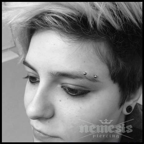 Horizontal eyebrow piercing | Eyebrow piercing, Eyebrow piercing girl ...