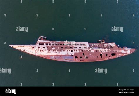 This aerial photo shows the capsized hull of "Al Mansur, the private ...