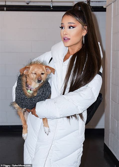 Ariana Grande Shows Puppy Love With Her Dog Toulouse As She Serves