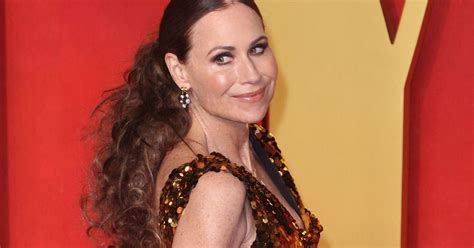 Classy Minnie Driver Stuns In Black Bikini Photos