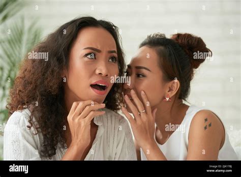 Woman Sharing Secret With Her Friend Stock Photo Alamy