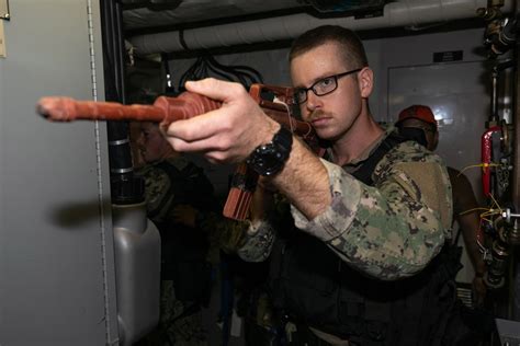 DVIDS Images USS Sioux City Sailor Clears Space During A VBSS Drill