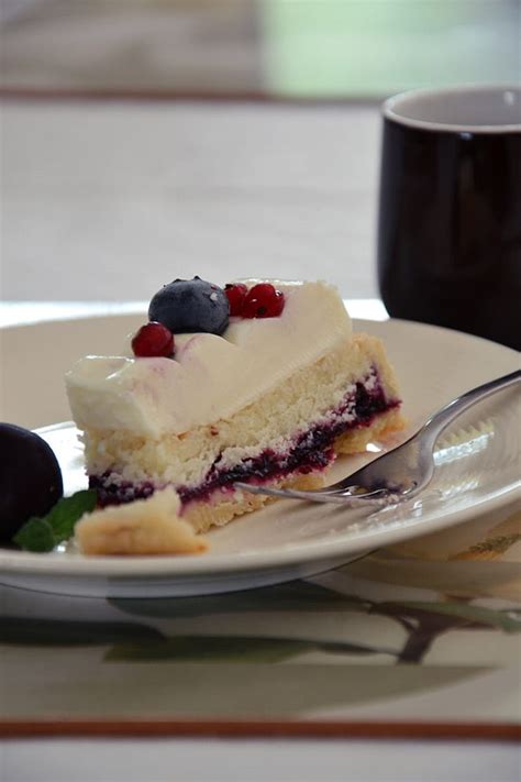 Black Currant And Coconut Frangipane Tart With Panna Cotta