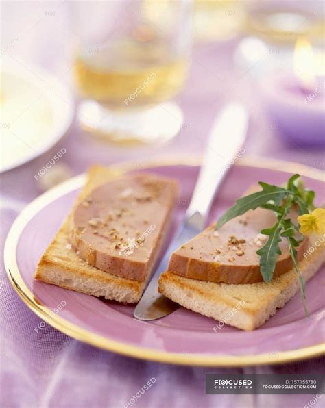 Foie gras on toast — portion, seasoned - Stock Photo | #157155780