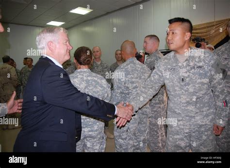 Secretary Of Defense Robert M Gates Shakes Hands With Army 1st Lt