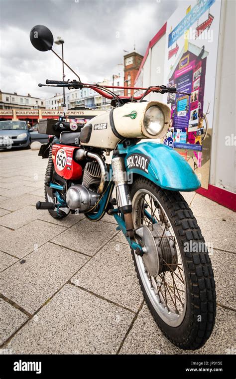 Vintage East German bike, made by OMZ. Parked on pavement. Low angle ...