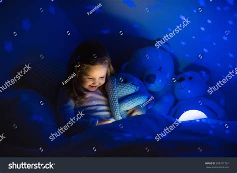 Little Girl Reading Book Bed Dark Stock Photo 358101761 | Shutterstock