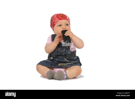 baby playing with mobile phone, Germany Stock Photo - Alamy