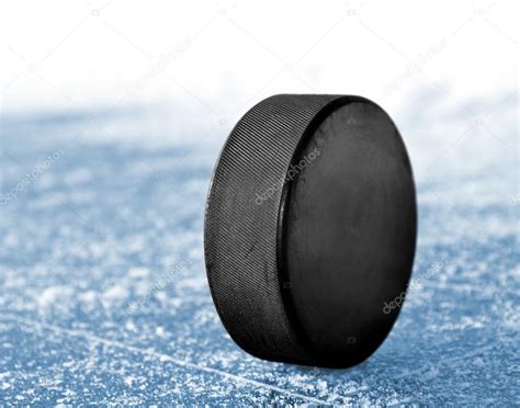 Black hockey puck — Stock Photo © vencav #16310837